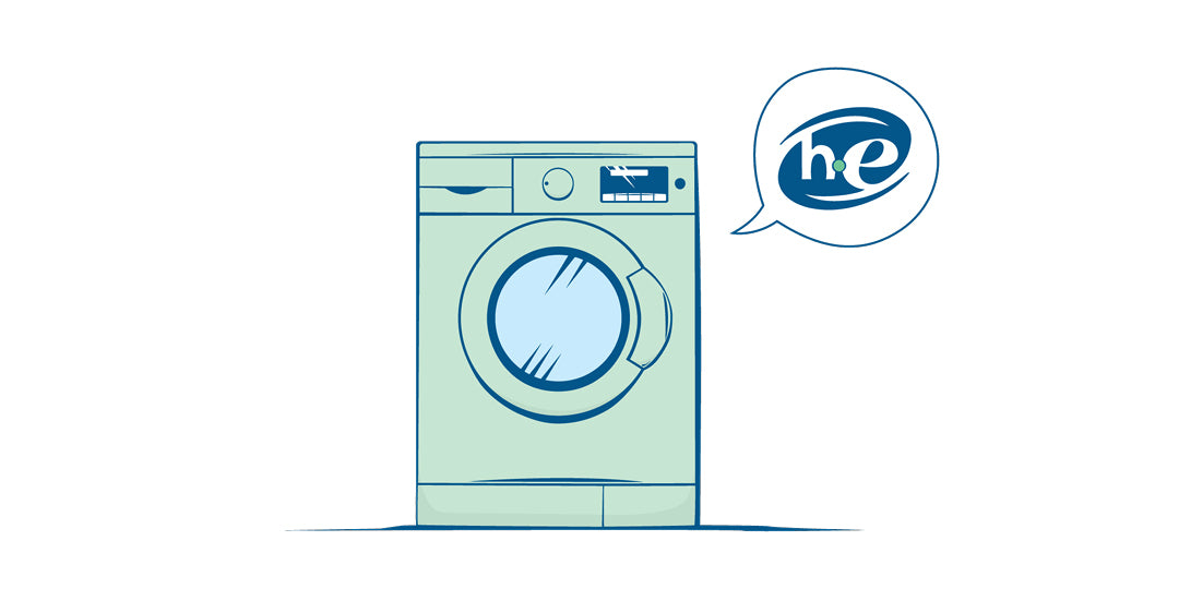 A Speech Balloon filled with 'he' text pointing towards a Green coloured Front Load Washing Machine