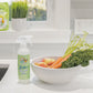 Nellie's Fruit and Veggie Spray Wash and a Bowl of Fruits and Veggies